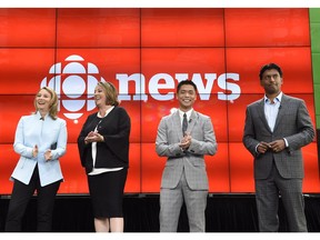 Adrienne Arsenault, Rosemary Barton, Andrew Chang and Ian Hanomansing (left to right) are named the new hosts of "The National," at a news conference in Toronto on Aug. 1.