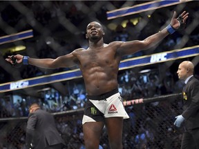 Jon Jones reacts after knocking out Daniel Cormier to win the light heavyweight title during UFC 214 in Anaheim, Calif., on July 29. Jones subsequently tested positive for a banned substance.