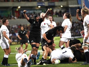 New Zealand's Eloise Blackwell, left, celebrates after Toka Natua scored a try during their Women's Rugby World Cup final in Belfast, Northern Ireland, Saturday, Aug. 26, 2017.