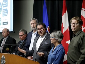 Mayor Naheed Nenshi is joined by city council members during a press conference about the Flames arena at city hall in Calgary on Friday September 15, 2017. Leah Hennel/Postmedia POSTMEDIA calgary Leah Hennel, Leah Hennel/Postmedia