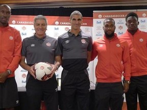 Captain Atiba Hutchinson (left to right), coach Octavio Zambrano, assistant coach Paul Stalteri, Junior Hoilett and Alphonso Davies attend a Canada Soccer Association news conference in Toronto, Thursday, Aug.31, 2017, ahead of Saturday’s friendly with Jamaica at BMO Field. THE CANADIAN PRESS/Neil Davidson