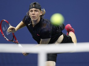 Denis Shapovalov, of Canada, serves to Jo-Wilfried Tsonga, of France, at the U.S. Open tennis tournament in New York, Wednesday, Aug. 30, 2017.