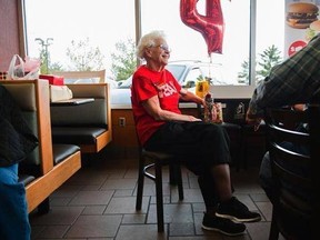 FILE - In a Friday, March 24, 2017, file photo, Loraine Maurerchats visits with customers at the N. Green River McDonald&#039;s location in Evansville, Ind., where a celebration was held in recognition of her more than four decades of work at local McDonald&#039;s restaurants. More Americans age 65 and over are still punching the clock, and the last time the percentage was this high was when John F. Kennedy was in the White House. In April 2017, 19 percent of Americans age 65 and over were still working,