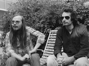 FILE - In this Oct. 29, 1977, file photo, Walter Becker, left, and Donald Fagen of Steely Dan, sit in Los Angeles. Becker, the guitarist, bassist and co-founder of the rock group Steely Dan, has died. He was 67. His official website announced his death Sunday, Sept. 3, 2017, with no further details. (AP Photo/Nick Ut, File)