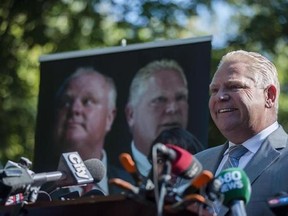 Former Toronto city councillor Doug Ford announces he is publishing a book: &ampquot;Ford Nation, Two Brothers, One Vision: The True Story of the People&#039;s Mayor,&ampquot; at a news confererce in Toronto, Tuesday, Sept.13, 2016. Former Toronto city councillor Doug Ford says he will be running for mayor in the 2018 municipal election. THE CANADIAN PRESS/Christopher Katsarov