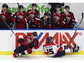 Jordy Bellerive of the Lethbridge Hurricanes is bowled over by Thomas Foster of the  Vancouver Giants during WHL action last November in Langley.
Bellerive signed a three-year entry-level deal Saturday with the Pittsburgh Penguins.