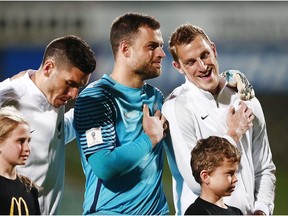 Captain Chris Wood and goalkeeper Stefan Marinovic of New Zealand shares a laugh at the lineup prior to the 2018 FIFA World Cup Qualifier match between the New Zealand All Whites and Solomon Islands at North Harbour Stadium on September 1, 2017 in Auckland, New Zealand.