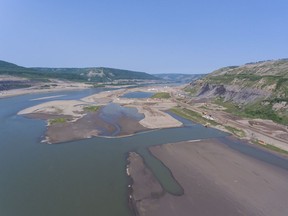 Construction work goes on at B.C. Hydro's Site C dam project on the Peace River in July.