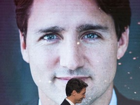 Canadian Prime Minister Justin Trudeau walks on to the stage before speaking at the Atlantic Council Global Citizen Awards Gala dinner at the Intrepid Sea, Air & Space Museum in New York City, Tuesday September 19, 2017. THE CANADIAN PRESS/Adrian Wyld