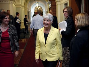 Finance Minister Carole James leaves the legislative assembly in Victoria Monday after delivering her B.C. budget update.
