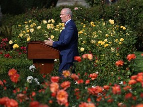 Premier John Horgan holds a press conference from the rose garden at Legislature following the speech from the throne last week.