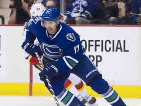 Anton Rodin handles the puck against the Calgary Flames during one of the three games he played for the Vancouver Canucks last season. Rodin, drafted by the Canucks in 2009, returned to North America last season after a Swedish Hockey League MVP campaign for Brynas IF in 2015-16.