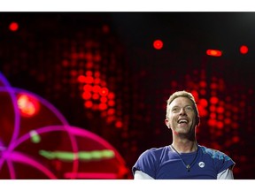 Coldplay's lead singer Chris Martin on stage during a concert for A Head Full of Dreams Tour at BC Place, Vancouver, September 29 2017.