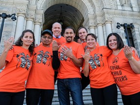 B.C. Premier John Horgan tweeted this photo saying "#OrangeShirtDay reminds us not to turn away from the difficult stories about residential schools. #EveryChildMatters"