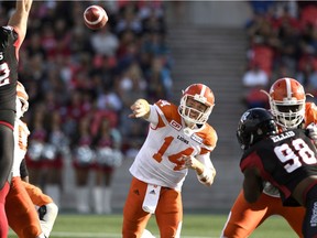 B.C. Lions quarterback Travis Lulay throws the ball against the Ottawa Redblacks during the second half of a CFL football game in Ottawa last week. His 21-point fourth-quarter performance nearly rallied the Lions to victory.