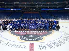 The Vancouver Canucks pose for a team photograph before their first practice at Mercedes-Benz Arena September 19, 2017 in Shanghai, China. The Vancouver Canucks and LA Kings will play two pre-season games in China.