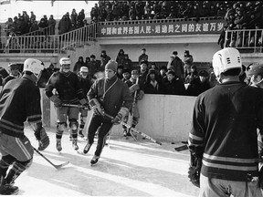 Coach Bob Hindmarch and the UBC team conduct a clinic for young players in Harbin, China in 1973.