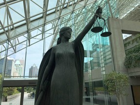 The justice statue in the Great Hall of the Vancouver Law Courts.