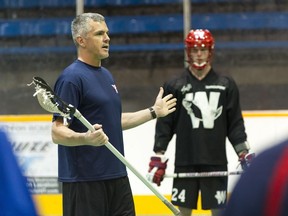 Assistant Coach Russ Heard speaks to the New Westminster Salmonbellies at practice at Queens Park Arena in New Westminster.