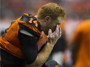 B.C. Lions quarterback Travis Lulay sits on the sidelines after injuring his knee against the Montreal Alouettes on Friday at B.C. Place Stadium in Vancouver.