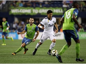 Fred Montery of the Vancouver Whitecaps had an unsuccessful return to Seattle on Wednesday night. The former Sounder, pursued here by Victor Rodriguez, and the Caps dropped a 3-0 MLS match at CenturyLink Field in Seattle.