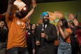 Leadership contender Jagmeet Singh dances on stage with supporters after speaking at the NDP's Leadership Showcase in Hamilton, Ont. on Sunday September 17 , 2017.