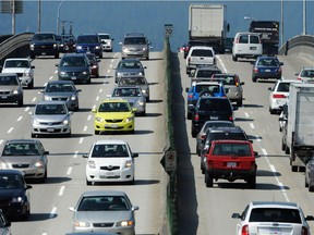 Traffic travels on Highway 1 over the Second Narrows Ironworkers Memorial Bridge July 10, 2012.