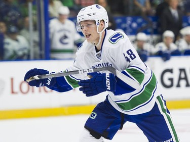 Vancouver Canucks Olli Juolevi skates during NHL preseason hockey action against the Winnipeg Jets.