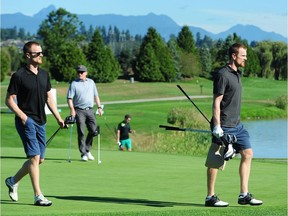 Henrik (left) and Daniel Sedin walk the links during the Vancouver Canucks’ annual Jake Milford Charity Invitational golf tournament at Northview Golf and Country Club in Surrey on Monday.