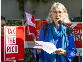 VANCOUVER, Jean Swanson and supporters rally at Chip Wilson's $75 million property to call for a Mansion Tax. Swanson presented a new notice of assessment to Chip Wilson.,September 23 2017. , Vancouver, September 23 2017. Reporter: , ( Francis Georgian / PNG staff photo) ( Prov / Sun News ) 00050717A [PNG Merlin Archive] Francis Georgian, PNG