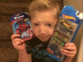 Jackson Bezzant with gifts from neighbours who heard about the bullying he faced in school.