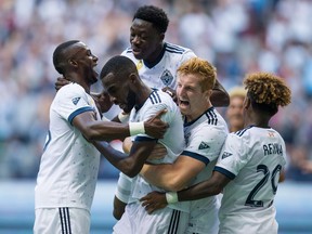 Bernie Ibini, Tony Tchani, Alphonso Davies, Tim Parker, Yordy Reyna

Vancouver Whitecaps' Bernie Ibini, from left, Tony Tchani, Alphonso Davies, Tim Parker and Yordy Reyna celebrate Tchani's tying goal against the Columbus Crew during the second half of an MLS soccer game in Vancouver, B.C., on Saturday September 16, 2017. THE CANADIAN PRESS/Darryl Dyck ORG XMIT: VCRD114
DARRYL DYCK,