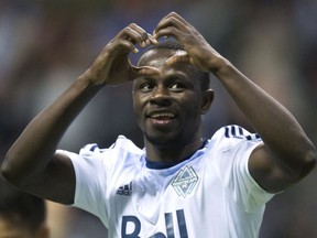 In this April 23, 2016, file photo, Vancouver Whitecaps' Kekuta Manneh celebrates his goal against FC Dallas during the second half of an MLS soccer game, in Vancouver.
