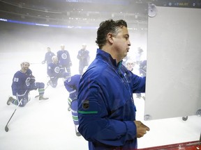 Travis Green will begin his first regular season as coach of the Canucks when his NHL team faces the Edmonton Oilers Saturday night in Vancouver.