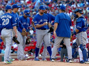 In this Oct. 12, 2015 file photo, Toronto Blue Jays manager John Gibbons pulls starter R.A. Dickey from Game 4 of the ALDS against the Texas Rangers in the fifth inning.