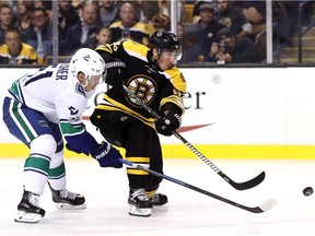 Vancouver Canucks v Boston Bruins

BOSTON, MA - OCTOBER 19: Brad Marchand #63 of the Boston Bruins takes a shot against Troy Stecher #51 of the Vancouver Canucks during the third period at TD Garden on October 19, 2017 in Boston, Massachusetts. The Bruins defeat the Canucks 6-3. (Photo by Maddie Meyer/Getty Images) ORG XMIT: 775040655
Maddie Meyer, Getty Images