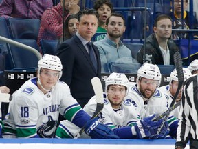 Vancouver Canucks head coach Travis Green keeps an eye on his team, which played its third game in four nights and still managed a 4-2 win in Buffalo.