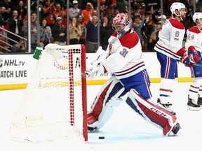 Canadiens' Carey Price smashes his stick against the post after giving up the sixth goal to the Ducks during a 6-0 loss in Anaheim on Friday, Oct. 20, 2017.