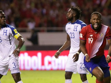 Kendall Waston heads to score against Honduras during their 2018 World Cup qualifier match on Saturday in San Jose.