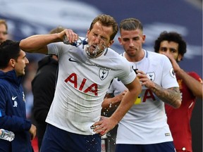 Tottenham Hotspur's English striker Harry Kane takes a drink during a break in play during the English Premier League football match between Tottenham Hotspur and Liverpool at Wembley Stadium in London, on October 22, 2017. Tottenham won the game 4-1.