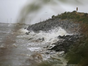 Gulf Coast waves crash against rocks as winds continue to speed up in Coden, Ala., on Saturday, Oct. 7, 2017, ahead of Hurricane Nate, expected to make landfall on the Gulf Coast later in the day.