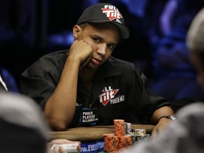 In this July 15, 2009 file photo, Phil Ivey looks up during the World Series of Poker at the Rio Hotel and Casino in Las Vegas. Hes long been a winner at cards, but American poker star Phil Iveys good fortune does not extend to Britains Supreme Court, he lost a major case Wednesday, Oct. 25, 2017, that will keep him from cashing in.
