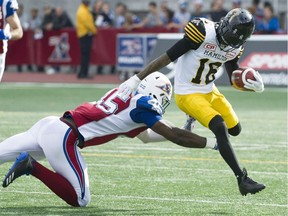 Brandon Banks, Oumar Toure,

Hamilton Tiger-Cats' Brandon Banks (16) breaks away from Montreal Alouettes' Oumar Toure during first half CFL football action in Montreal, Sunday, October 22, 2017. THE CANADIAN PRESS/Graham Hughes ORG XMIT: GMH106
Graham Hughes,
