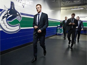 Daniel Sedin of the Vancouver Canucks walks to the dressing room before their NHL game against the Edmonton Oilers at Rogers Arena on Saturday.
