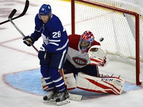 In this Sept. 25 file photo, Toronto Maple Leafs forward Connor Brown screens Montreal Canadiens goalie Al Montoya in pre-season.