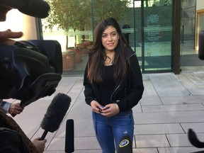 Mary Hare talks to reporters outside the Vancouver Law Courts building recently.