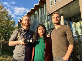 From left, AMS VICE coordinator Alex Dauncey, AMS student services manager Marium Hamid and AMS president Alan Ehrenholz stand outside the student-union building at the University of B.C. with a naloxone kit.
