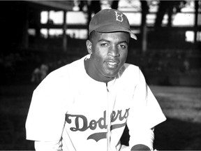Robinson

FILE - In this April 11, 1947 file photo, Jackie Robinson of the Brooklyn Dodgers poses at Ebbets Field in the Brooklyn borough of New York. A specially padded baseball cap that Jackie Robinson wore for protection against beanballs has sold for $590,994 at auction.The blue Brooklyn Dodgers hat sold Saturday, Oct. 28, 2017, after a monthlong online auction through the sports auctioneers Lelands. Lelands says Robinson wore the hat when he broke baseball's color barrier in 1947. (AP Photo/John Rooney, File) ORG XMIT: NYSH101

APRIL 11, 1947 FILE PHOTO;
JOHN ROONEY, AP