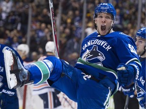 Vancouver Canucks forward Bo Horvat celebrates the first of his two goals against the Edmonton Oilers Saturday night at Rogers Arena. It was the Canucks' season and home opener.