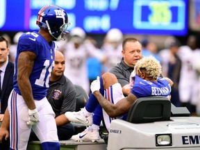 EAST RUTHERFORD, NJ - OCTOBER 08:  Odell Beckham #13 of the New York Giants is carted off the field after sustaining an injury during the fourth quarter against the Los Angeles Chargers during an NFL game at MetLife Stadium on October 8, 2017 in East Rutherford, New Jersey. The Los Angeles Chargers defeated the New York Giants 27-22.  (Photo by Steven Ryan/Getty Images) ORG XMIT: 700070665